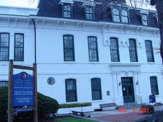 a large white building with many windows on it