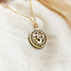 "This spiritual Sanskrit Ohm Mantra pendant is decorated with filigree ornament,   can give us many benefits for  our physical levels and emotional bodies . Gold Om necklace can be great Christmas gift , as Yoga jewelry, Buddhist jewel. ♡ DETAILS  ✦  Pendant: 20 mm ( 0.78\") ✦ All metal parts are sterling silver 924 gold plated 24 k  ✦ Necklace length please choose ♡ BUYING AS A GIFT? Each item is  perfectly wrapped for gift giving or as a wonderful present for you! All items come packaged in a Spiritual Medallion Necklace With Filigree, Spiritual Medallion Necklace With Filigree Details, Spiritual Filigree Medallion Necklace, Spiritual Medallion Filigree Necklace, Spiritual Round Necklaces For Festivals, Spiritual Medallion Charm Necklace Gift, Spiritual Medallion Charm Necklace For Gifts, Amulet Necklace For Meditation With Intricate Design, Spiritual Round Pendant Necklace With Filigree