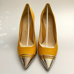 Check Out These Gorgeous Shoes!! Original Msrp $695! Almost Like New - Have Been Tried On But Never Worn. Please Look Carefully At Pictures For Condition. Guaranteed Authentic. Size 7.5/38 Eu Material: Calf Leather Color: Topaz Style: Pump Heel: 85mm Yellow Round Toe Heels For Work, Yellow Round Toe Heels For Office, Yellow Pointed Toe Heels For Work, Yellow Pointed Toe Heels For Workwear, Elegant Yellow Court Shoes With 4-inch Heel, Modern Yellow Heels For Formal Occasions, Modern Yellow Formal Heels, Yellow Heels With Contrasting Heel Counter, Luxury Spring Court Shoes With Round Toe