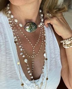 This exquisite necklace is crafted with a beautiful abalone nugget, an iridescent rainbow sea gem. Wear this timeless piece of jewelry to add a subtle, yet eye-catching sparkle to any outfit. Length 15-16" Abalone Shell is said to enhance feelings of peace, compassion and love. The power of abalone shells is found to be influenced by the power of Poseidon, the God of the Sea. All chakras Pearls are said to bring inner wisdom and help to strengthen and nurture the growth of love. In the Roman Emp Crystal Bead Necklace Diy, Pearl Layering, Symbol Of Change, Boho Beaded Necklace, Maori Culture, Abalone Jewelry, Maori People, Abalone Necklace, Layered Pearl Necklace