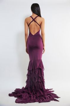 Wine halter neck gown with sheer panelled waistband and ruffle pleated border. - Aza Fashions Pre-draped Ruffle Prom Dress, Purple Sleeveless Ruffled Gown, Gala Dresses With Ruched Bodice And Ruffled Straps, Sleeveless Gown With Ruched Back For Prom, Elegant Evening Gown With Ruffled Straps, Elegant Gown With Ruffles And Ruffled Straps, Elegant Gown With Ruffled Straps And Details, Elegant Gown With Ruffled Straps, Sleeveless Gown With Ruched Back For Gala