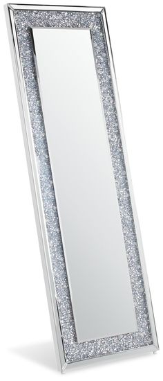 a mirror that is sitting on top of a white table cloths and silver glitter