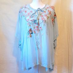 Johnny Was Blouse Light Blue With Multi-Colored Embroidery And Flutter Sleeves. Details: Light Blue Floral & Birds Embroidery Tie Neck Bat Wing Sleeve Gorgeous Drape Lightweight And Semi-Opaque Measured In Inches Straight Across. Length:29 Sleeves:17 Shoulders: 38 (Loose Shoulder) Light Blue Bohemian Blouse With Floral Print, Blue Bohemian Tops For Daywear, Bohemian Light Blue Floral Print Blouse, Bohemian Blue Tops For Daywear, Spring Tunic Blouse With Embroidered Hem, Spring Embroidered Blouse, Spring Bohemian Blouse With Butterfly Sleeves, Spring Embroidered Blouse For Daywear, Embroidered Peasant Top For Summer Daywear