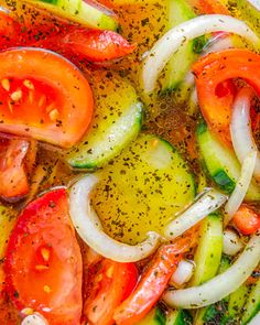 a white bowl filled with vegetables and seasoning