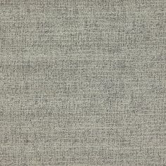 an upholstered textured fabric background in grey and white