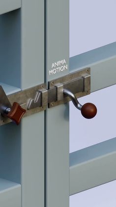 an image of a door handle that is attached to the outside of a metal door