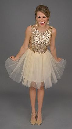 Precious Moments Dress Glamorous Gold Tulle Dresses, Gold Tulle Dresses For Prom Season, Champagne Tulle Dress With Sequins, Gold Sequin Dress For Homecoming Party Season, Gold Sequin Dress For Homecoming And Prom Season, Gold Sequin Homecoming Dress For Party Season, Bridesmaid Dress With Sequins And Glitter Tulle, Bridesmaid Glitter Tulle Dress With Sequins, Gold Sequined Bridesmaid Dress