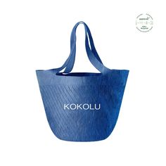 DETAILS & DESCRIPTION Grab your KOKOLU and hit the road with this durable nylon-like tote bag made from 100% recycled post-consumer plastic bottles. With the perfect blend of style, structure, and function, green has never looked this good. Eco-friendly Blue Bags For Shopping, Blue Plastic Tote Bag, Eco-friendly Blue Beach Bag For Vacation, Blue Plastic Beach Bag, Trending Totes, Eco-friendly Blue Bucket Beach Bag, Work Tote, Laptop Pocket, Plastic Bottles