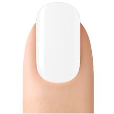 a white manicure on the tip of someone's hand with light brown nails