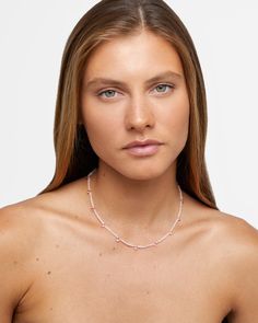 This necklace showcases soft pink hues, blending rose quartz and sparkling pink topaz for a gentle yet sophisticated look. Its delicate drop-style gemstones create a timeless and romantic aesthetic. 14 karat yellow gold Rose Quartz 16 to 17 inches length 3mm bead size Style # JJ-NAZ-418 UPC 810109742288 Gem Gem, Rose Quartz Pink, Romantic Aesthetic, Candy Necklaces, Rainbow Sapphires, Quartz Pink, Rose Gold Quartz, Pink Topaz, Citrine Crystal