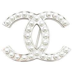 Chanel Classic Silver CC Pearl Brooch *Marked 05 *Made in France *Comes with the original box -Approximately 1.6″ x 1″ -Very pretty and classic -In a very good condition 2075-43572 Chanel Cologne, Crystal Wedding Necklace, Chanel Pearls, Pearl Brooch, Crystal Wedding, Silver Pearls, Wedding Necklace, Chanel Classic, Costume Jewelry