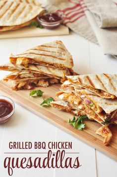 grilled bbq chicken quesadillas on a cutting board with salsa in the background