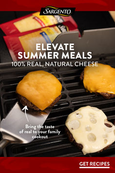 three hamburgers with cheese are on the grill