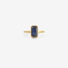 Details Gabriella Kiss 18k yellow gold & emerald-cut dark blue sapphire ring, size 7. The 2.1ct stone measures approximately 3/8" x 1/4" & is set in Gabriella's signature scalloped bezel setting. - sapphire, 1.6ct - 18k yellow gold - size 7 Sizing This ring can be resized. Please allow 2 - 6 weeks. Inquire about sizing fee. Emerald Cut Sapphire Ring With Bezel Setting, Heirloom Sapphire Ring With Emerald Cut Bezel Setting, Blue Emerald Cut 14k Gold Sapphire Ring, 14k Gold Emerald-cut Sapphire Ring With Center Stone, 14k Gold Emerald-cut Sapphire Ring With Polished Finish, Mirror Paper, Engagement Necklaces, Stone Engagement, Cuff Bangle Bracelet