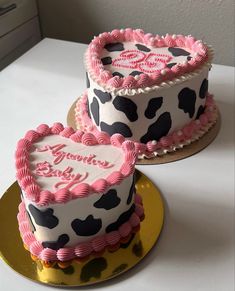 Birthday cake with cow print icing and pink piping with Aquarius Baby and 25 written on it Western Pink Cake, Cow Print 21st Birthday Cake, Cow Heart Cake, Cow Print Heart Cake, Pink Cowgirl Cake Ideas, Cow Bday Cake, Cow Cake Buttercream, Cow Girl Birthday Party Theme Adult, Strawberry Cow Cake