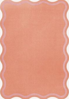 an orange and pink rug with scalloped edges on the bottom, in front of a white background