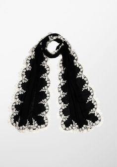 Woven from a fine silk and wool blend, this black scarf features a contrasting beige bold scalloped edging lace border. This chic and contemporary accessory keeps you stylishly warm. Elegant Shawl Scarf With Lace Trim, Elegant Lace Trim Shawl Scarf, Elegant Black Lace Shawl, Contemporary Accessories, Black Scarf, Lace Border, Scalloped Lace, Wool Scarf, Black Silk