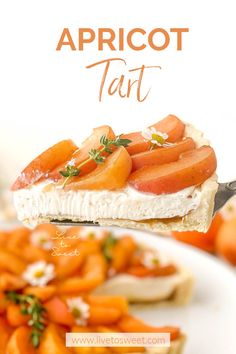 a close up of food on a plate with carrots and tart in the background