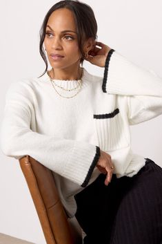 Stay cozy-chic with the Uptown Girl Sweater by Sanctuary. Finished with contrasting tipping at the pocket and cuffs, this stylish pullover features a relaxed crewneck silhouette, ribbed trim, and wide long sleeves with dropped shoulders. Pair with a midi skirt, trousers, or your favorite jeans. | SANCTUARY Women's Uptown Girl Pullover, Size XS, White Fall Long Sleeve Sweater With Contrast Trim, Long Sleeve Sweater With Contrast Trim For Work, Trendy Crew Neck Sweater With Pockets, White Sweater With Pockets For Layering, Chic White Sweater With Pockets, Casual Fall Sweater With Contrast Trim, Casual Sweater With Contrast Trim For Fall, White Layering Sweater With Pockets, Casual Winter Sweater With Contrast Trim