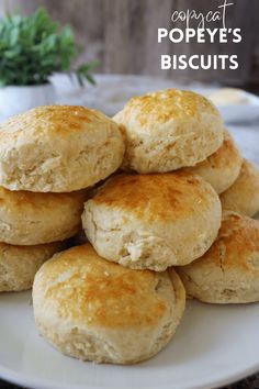 a pile of biscuits sitting on top of a white plate