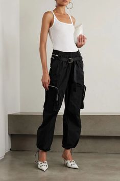 Elevated details and thoughtfully engineered cuts make Dion Lee's designs stand out on any rail. You'll gravitate towards these pants, made from cotton-blend and topped with a belt bag plus oversized cargo pockets. Juxtapose the utilitarian feel with a sheer top..Model is 180cm/ 5'11' and is wearing a size Xsmall.Cargo pants.Cotton-blend.Detachable application.Multipockets.Elasticated waist.High-rise cut.Pull on.Mid-weight, non-stretchy fabric.Dry clean.Imported.Size & Fit:.Designed for a relaxe Sporty Looks, Dion Lee, Style Upgrade, Cargo Pants Women, Sheer Top, Cotton Bag, Black Media, Daily Outfits, Net A Porter