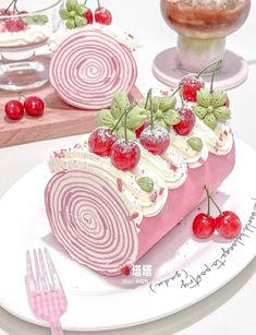 a piece of cake sitting on top of a plate next to a fork and knife