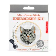 a cross stitch kit with an image of a cat