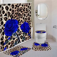 a bathroom with leopard print and blue roses on the shower curtain, toilet seat covers and rugs