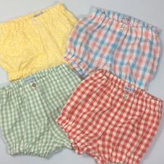 Cotton shorts for boy or girl. Either seersucker gingham, Gingham or plain cotton. Shell button detail on elasticated waist. 3-6m Waist... 6-12m Waist... 12-18m Waist... 18-24m Waist... 2-3yr Waist... From a smoke and pet free home. Summer Cotton Bloomers Short Style, Summer Cotton Short Bloomers, Playful Short Bloomers For Summer, Summer Cotton Bloomers With Elastic Waistband, Playful Summer Short Bloomers, Summer Bottoms With Elastic Waistband For Playtime, Playful Summer Bloomers With Elastic Waistband, Cute Cotton Bloomers For Beach, Playful Shorts For Summer Playtime