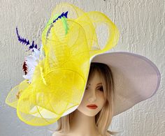 This beautiful hat is lightweight and would be perfect for horse races, tea parties, bridal showers, church or any special event. Flower Hats For Kentucky Derby Races, Flower Hat For Royal Ascot Races, Yellow Hat For Spring Races, Spring Yellow Fascinator With Curved Brim, Yellow Flower Hat For Spring, Spring Yellow Curved Brim Fascinator, Yellow Flower-shaped Hats For Spring, Whimsical Summer Hats For Races, Yellow Mini Hats For Spring Wedding