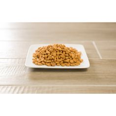 a white plate filled with food on top of a wooden table