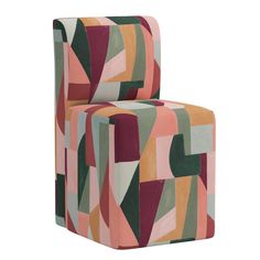 an upholstered chair with multicolored shapes