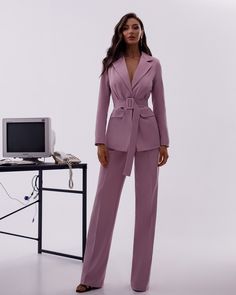 2-piece Womens Blazer Trouser Suit for office, business meetings, formal events and special occasions. Also perfectly combines with sneakers so after a long and tiring business day you can change you heels to sneakers and still look chic. DETAILS -  wide leg pants - 35,8 inches inseam (91cm) -  high rise -  blazer is Buttoned and belted -  lined -  side pockets -  relaxed fit -  single breasted MATERIAL Premium quality suiting fabric, which consists of viscose mostly and a bit of polyester and elastane  SIZES The models in photos are wearing a size S Available in 4 sizes: XS= 2 US numeric BUST 32-34 inches or 82-86 cm WAIST 23-24.8 inches or 59-63 cm HIPS 33-35 inches or 86-90 cm S= 4 US numeric BUST 34-35 inches or 86-90 cm WAIST 25-26 inches or 63-67 cm HIPS 35-37 inches or 90-94 cm M = Fitted Office Lady Pantsuit For Business Meetings, Office Lady Pantsuit For Business Meetings, Office Lady Suit With Notch Lapel For Business Meetings, Notch Lapel Suits For Business Meetings, Tailored Office Lady Pantsuit For Business Meetings, Tailored Pantsuit For Office Lady At Business Meetings, Tailored Pantsuit For Business Meetings, Solid Color Office Lady Pantsuit For Workwear, Professional Sets With Notch Lapel For Business Meetings