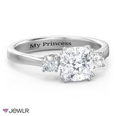 a three stone engagement ring with the words my princess on it