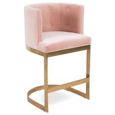 a pink velvet bar stool with gold frame