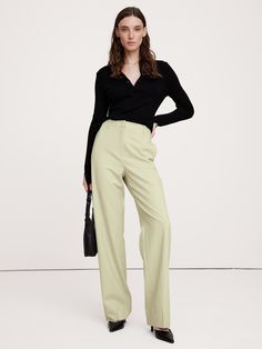 We cut this pant for a sleek and sharply-tailored fit, opting for a barely-there Hollywood waistband and darts at the back waist to create a clean look that's also ultra-comfortable.  For fabric, we reached for our Siena Italian wool—a customer favorite for its all-weather weight and hint of stretch.  High Rise Modern Straight: High rise (12") with a relaxed fit through the thighs and a straight leg.  Full length.  Fabric from Italy's Marzotto mill.  Responsible Wool Standard Certified: This global standard protects the sheep that supply the wool for this garment as well as the land they graze, working to make it better for the environment and the sheep.  Zip fly with hook-and-bar closure.  Front and back pockets.  Unlined.  High Rise Modern Straight: High rise (12") with a relaxed fit thr Flannel Pants, Petite Shorts, Wool Flannel, The Sheep, Wool Pants, Pants Straight, Bottom Clothes, Straight Pants, Bottoms Pants