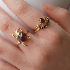 Bug Wedding Rings, Symbolic Gemstone Wedding Rings, Symbolic Wedding Gemstone Rings, Symbolic Gemstone Rings For Wedding, Symbolic Gemstone Rings As Gifts, Unique Rings With Gemstone Accents Gift, Unique Gemstone Accented Rings As Gift, Gift Yellow Gold Ruby Ring With Gemstone Accents, Gift Ruby Ring In Yellow Gold With Gemstone Accents