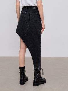 MO&Co. Women's Cotton Irregular Denim Skirt Features : - Scimitar notch design - High waist Code : MBB3SKT034Length of size M is 93cmBlack : Model is 178m tall and wearing a size M MATERIALS & CARE : Material : 100% CottonMachine wash under 30℃Do not bleach, hang to dry Do not tumble dry, iron at low temperature Do not dry clean, do not expose to the sun The reverse side is washed in a mesh bag, do not soakTips : 1. The leather tag part should not be ironed or wiped. 2. Denim products have a sli Casual Bottoms With Asymmetrical Hem In Dark Wash, Casual Dark Wash Bottoms With Asymmetrical Hem, Asymmetrical Denim Skirt With Frayed Hem, Casual Dark Wash Skirt With Asymmetrical Hem, Casual Asymmetrical Hem Skirt, Dark Wash Fitted Denim Skirt With Asymmetrical Hem, Asymmetrical Denim Skirt With Pockets, Dark Wash Asymmetrical Skirt With Frayed Hem, Edgy Cotton Cutoff Denim Skirt