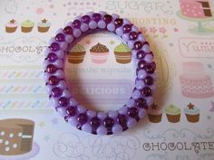 This is a Girls Beaded Bracelet. It would make a cute gift for a little girl's Birthday. They make great Birthday party favors. It has solid purple and dark purple tri beads. It was made with .8mm sturdy stretch string. I tie it several times to prevent breakage. It fits girls ages 5-8. It stretches to fit on the wrist. All items are ready to be shipped I do combined shipping. Items ship in 2-5 business days.  Check out more items at: http://www.etsy.com/shop/MesheleCrafts https://www.facebook.c Beaded Round Bracelets For Birthday, Handmade Stretch Bracelet For Birthday, Purple Round Beads Friendship Bracelets For Birthday, Purple Beaded Bracelets For Birthday, Purple Round Beads Friendship Bracelet For Birthday, Purple Beaded Bracelet For Birthday, Birthday Stretch Bracelet With Heart Beads, Birthday Beaded Wristband With Round Beads, Birthday Beaded Wristband