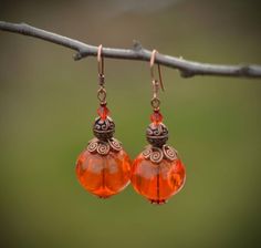 Orange lampwork Earrings Floral Earrings Gift for mom Long | Etsy Amber Beaded Drop Earrings For Gift, Amber Beaded Earrings For Gift, Orange Czech Glass Jewelry With Ear Wire, Handmade Amber Earrings In Czech Glass, Elegant Orange Copper Earrings, Orange Copper Dangle Earrings, Orange Czech Glass Dangle Earrings, Amber Earrings With Dangling Beads For Gift, Orange Wire Wrapped Earrings For Gift