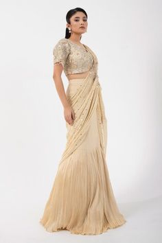 Gold pleated pre-draped skirt saree featuring attached sequin bead embellished pallu with applique and attached can can. Comes with bead embellished floral padded blouse. - Aza Fashions Skirt Saree, Applique Skirt, Gold Applique, Gold Skirt, Padded Blouse, Drape Saree, Draped Skirt, Can Can, Sequin Beading