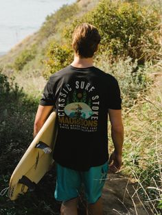 Crew neck short sleeve t-shirt with graphic on front and back 100% Cotton Jersey Features specialty treatment for a soft look and feel Model is 6' and is wearing size L Plain Black T Shirt, Australian Men, Surf Shirt, Pet Gear, Beach Boys, Surf Tshirt, Mens Back, Sun Shirt, Beach T Shirts