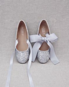 "Comfy and sparkly allover rock glitter ballet flats and with satin ribbon tie strap. Definitely will brighten up everything you wear. Perfect for bride and bridesmaids for comfy wear during wedding or after to change into. YOU CAN CHOOSE ON STYLE IF SHOES: BALLERINA LACE UP OR MARYJANE TIE DETAILS: SATIN LACE WIDTH: BALLERINA LACE UP (7/8 INCH) & MARYJANE TIE (1.5 INCHES) COLORS AVAILABLE: Gold, Silver, White, Rose Gold, Red and Navy UPPER: Synthetic upper and lining MATERIALS: Mandmade outsole