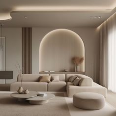 a modern living room with white furniture and beige walls, along with large round windows