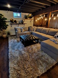 a living room filled with furniture and lights