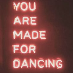 a neon sign that says you are made for dancing