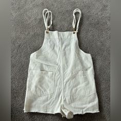 Nwt. Show Me Your Mumu Trude Romper In Seasalt. Size Small. Chic Cotton Shortalls Overall, Chic Cotton Shortalls, Chic Fitted Cotton Shortalls, Summer White Jumpsuits And Rompers With Pockets, Chic Cotton Overalls With Bib Front, White Overall Jumpsuits And Rompers With Pockets, White Sleeveless Overalls For Spring, Chic White Cotton Jumpsuits And Rompers, Fitted White Overalls For Spring