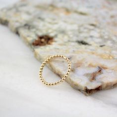 A delicate beaded stacking ring in 14k gold fill. Simple and sweet.  Wear it alone, or stacked with your other rings.  Order one, or order multiples to stack!  Please select your ring size during checkout.Your jewelry will arrive beautifully gift wrapped in a small box. If this is a gift being shipped directly to the recipient, please let me know. I will be glad to include a note from you.Want to see more of my work? Click here to return to my etsy shop: http://www.etsy.com/shop/SDJewelryFollow Dainty Hypoallergenic Rings With Round Beads, Dainty Hypoallergenic Beaded Rings, Ring Simple Gold, Ring Everyday, Brown Jewelry, Everyday Ring, Ring Simple, Everyday Rings, Velvet Ribbon