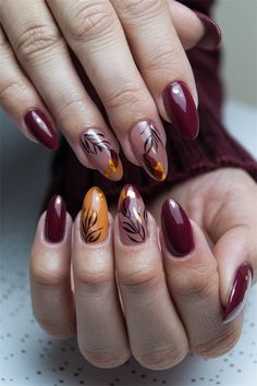 Embrace the spirit of Fall with these stunning nail ideas acrylic that capture the essence of autumn! Picture warm, earthy tones like rust, burnt orange, and deep burgundy beautifully blended into a chic, glossy finish. Add some leaf motifs or cozy plaid designs for a touch of seasonal charm. Perfect for cozy gatherings or a day out, these nails are sure to celebrate the beauty of Fall. Get inspired and transform your nails today! Red And Brown Fall Nails, Burgundy And Orange Nails, Fall Nail Ideas Acrylic, Fall Leaf Nails, Fall Plaid Nails, Nail Ideas Acrylic, Pumpkin Spice Nails, Fall Nail Ideas, Nail Designs Pictures