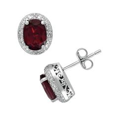 A timeless frame design with diamond accents and genuine garnet stones give these oval stud earrings unsurpassed beauty.Earring Details: Earring length: .43-in. Backings: post Metal: rhodium-plated sterling silverDiamond Details: Carat total weight: less than 1/10 Cut: round Setting: prongGemstone Details: Gemstone type: genuine garnet Cut: oval Setting: prongImage(s) may be enlarged to show detail.Diamond weights are approximate. Diamond total weights may vary between .01 and .08 ct. Some diamo Classic Oval Earrings With Gemstone Accents, Red Oval Jewelry With Pave Setting, Oval Red Jewelry With Pave Setting, Oval Earrings With Pave Setting For Anniversary, Oval Earrings With Diamond Accents For Gift, Classic Red Jewelry With Pave Setting, Red Oval Jewelry With Diamond Accents, Oval Cubic Zirconia Earrings With Gemstone Accents, Oval Earrings With Gemstone Accents In Cubic Zirconia